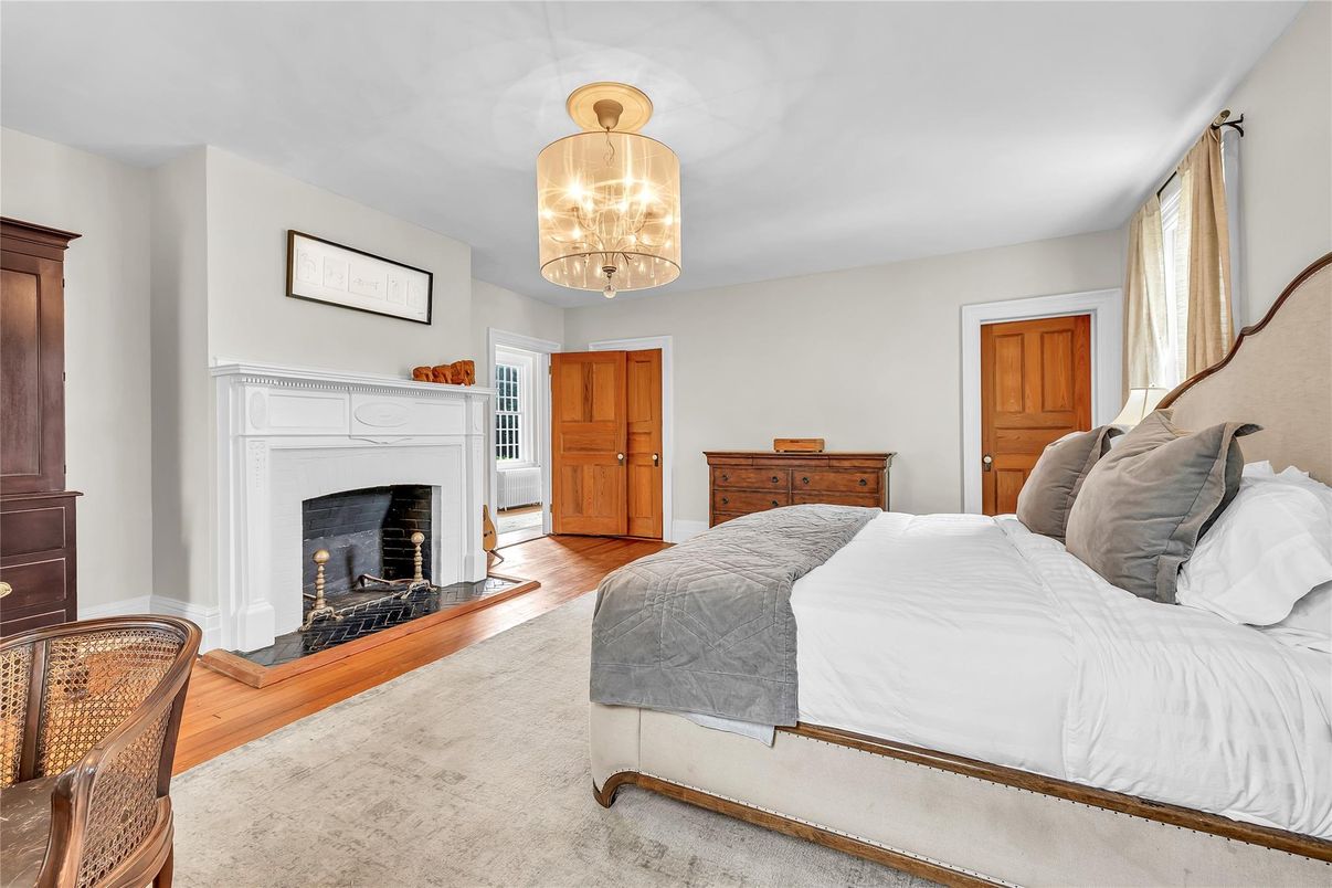 Bedroom, Chandelier, Fireplace, Interior, Pendant Lights, Wood Texture Flooring