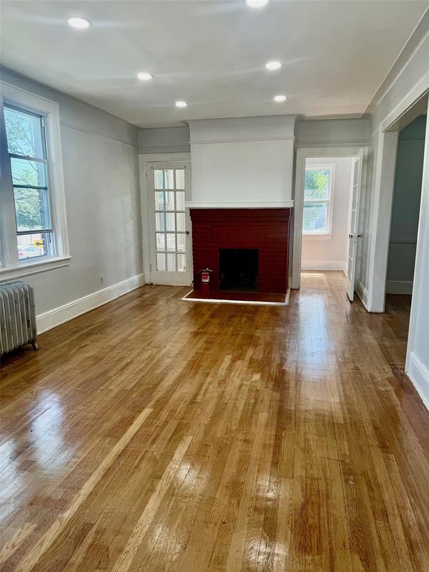 Empty room, Fireplace, Interior, Recessed Lighting, Wood Texture Flooring