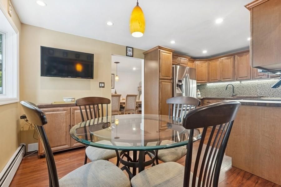 Dining room, Interior, Kitchen, Pendant Lights, Recessed Lighting, Stainless Steel Appliances, Wood Texture Flooring