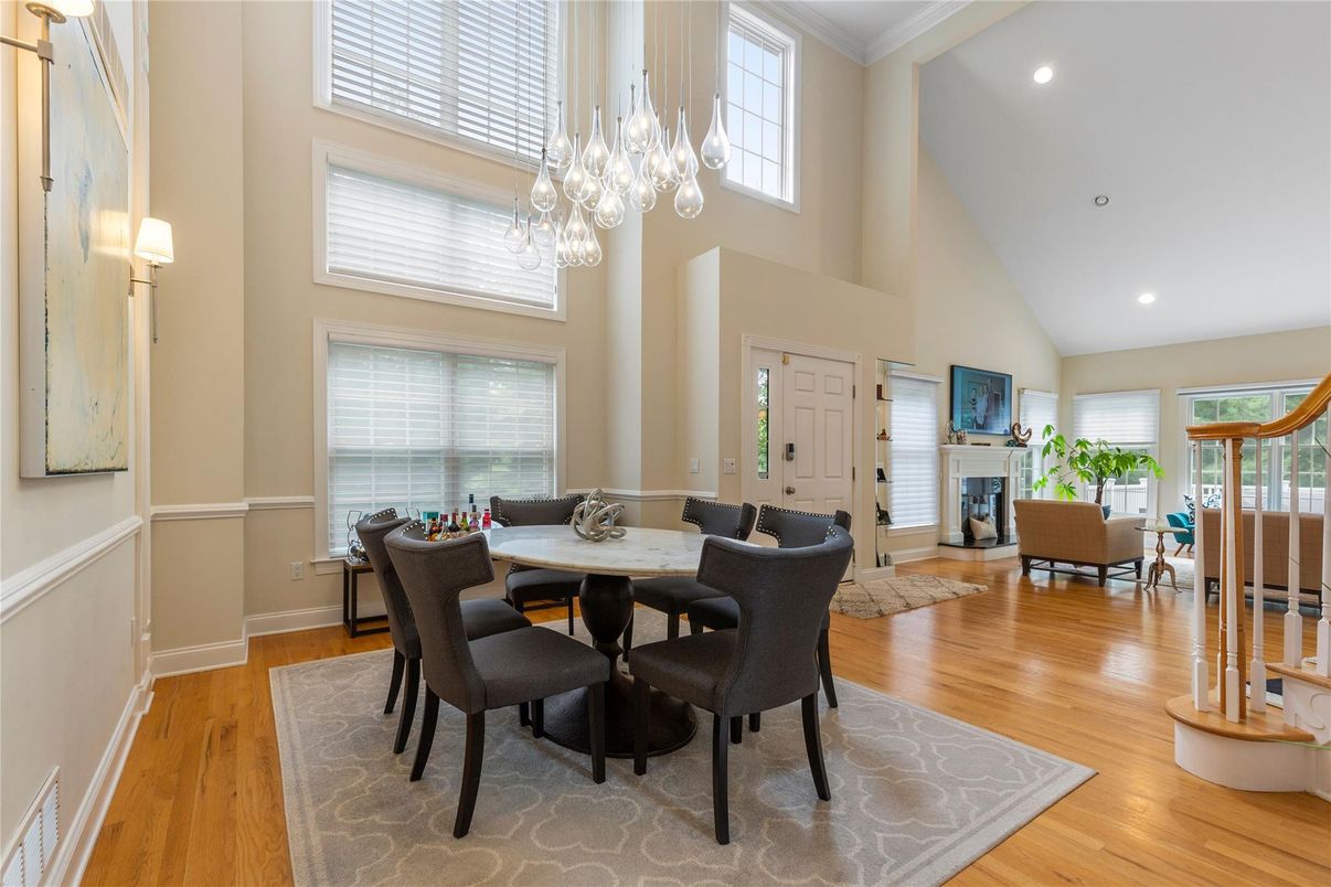 Chandelier, Dining room, Fireplace, Interior, Living room, Recessed Lighting, Wood Texture Flooring