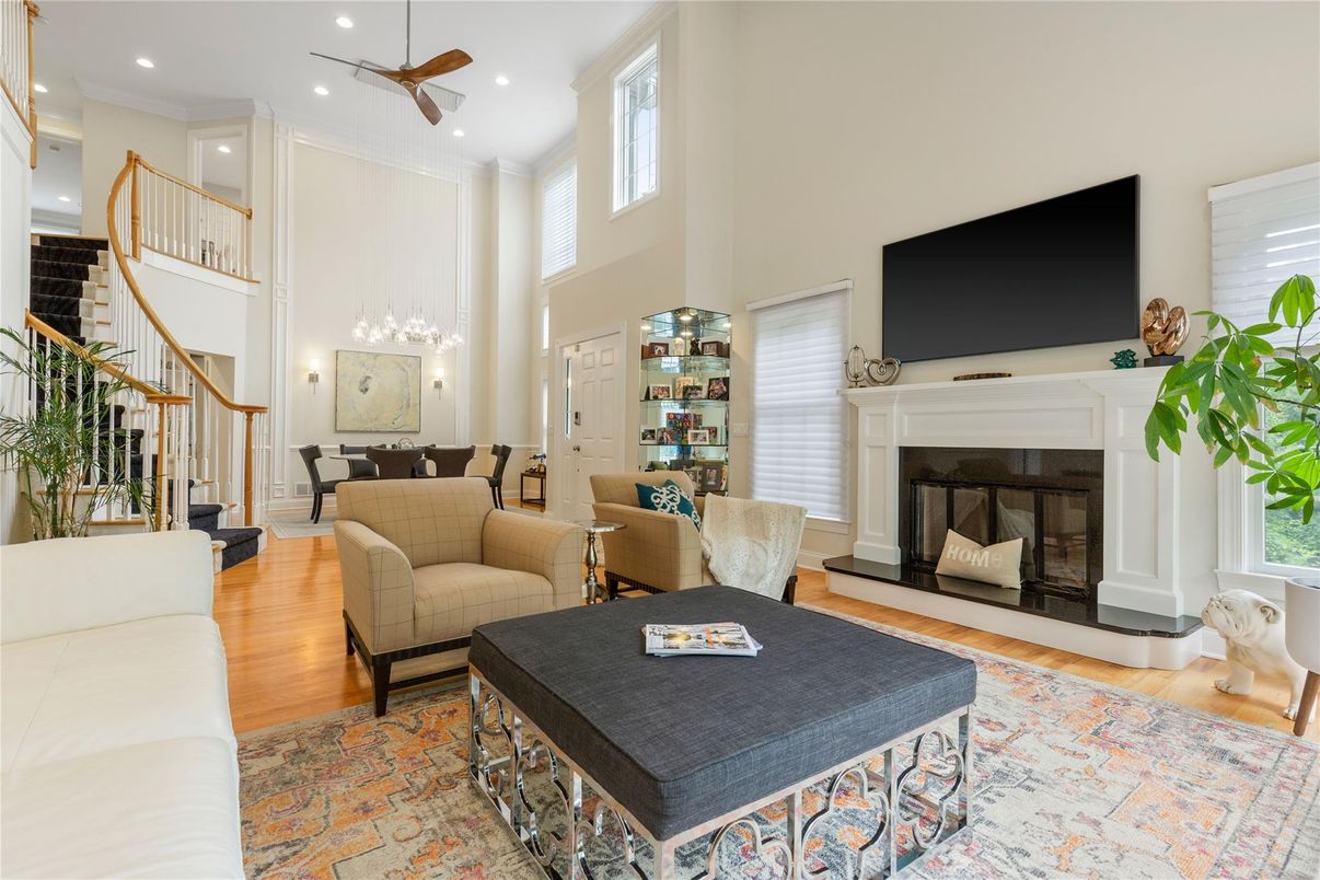 Dining room, Fireplace, Interior, Living room, Pendant Lights, Recessed Lighting, Wood Texture Flooring