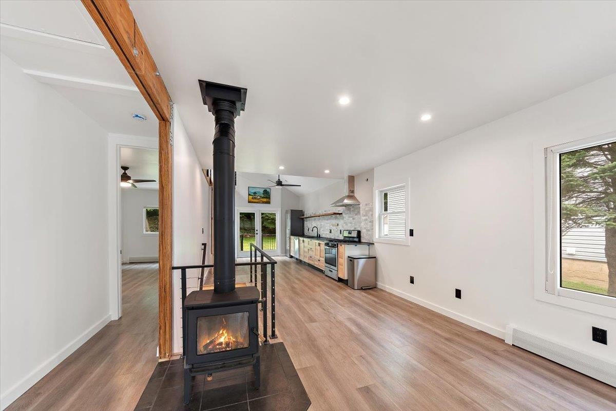 Fireplace, Interior, Kitchen, Recessed Lighting, Wood Texture Flooring
