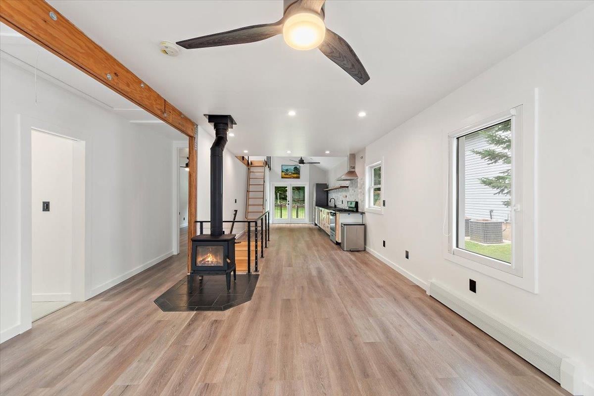 Empty room, Fireplace, Interior, Recessed Lighting, Wood Texture Flooring