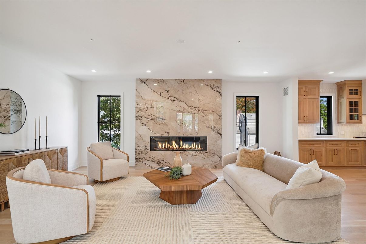 Fireplace, Interior, Living room, Marble Walls, Recessed Lighting, Wood Texture Flooring