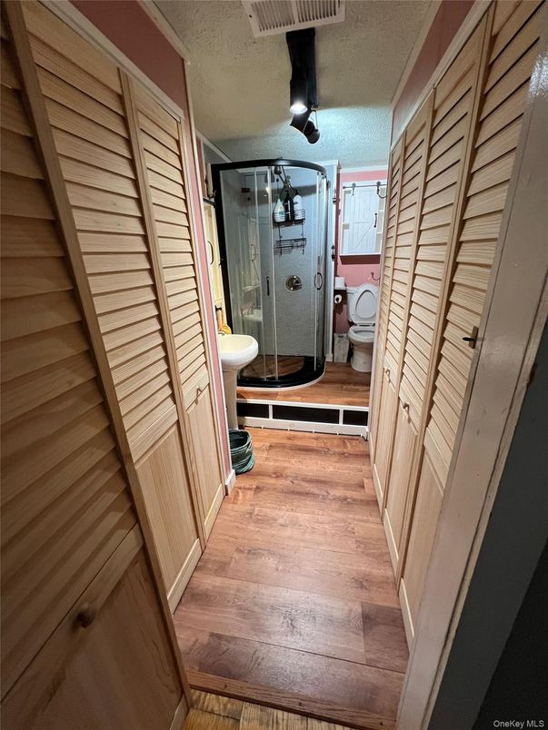 Bathroom, Glass Shower, Interior, Wood Texture Flooring