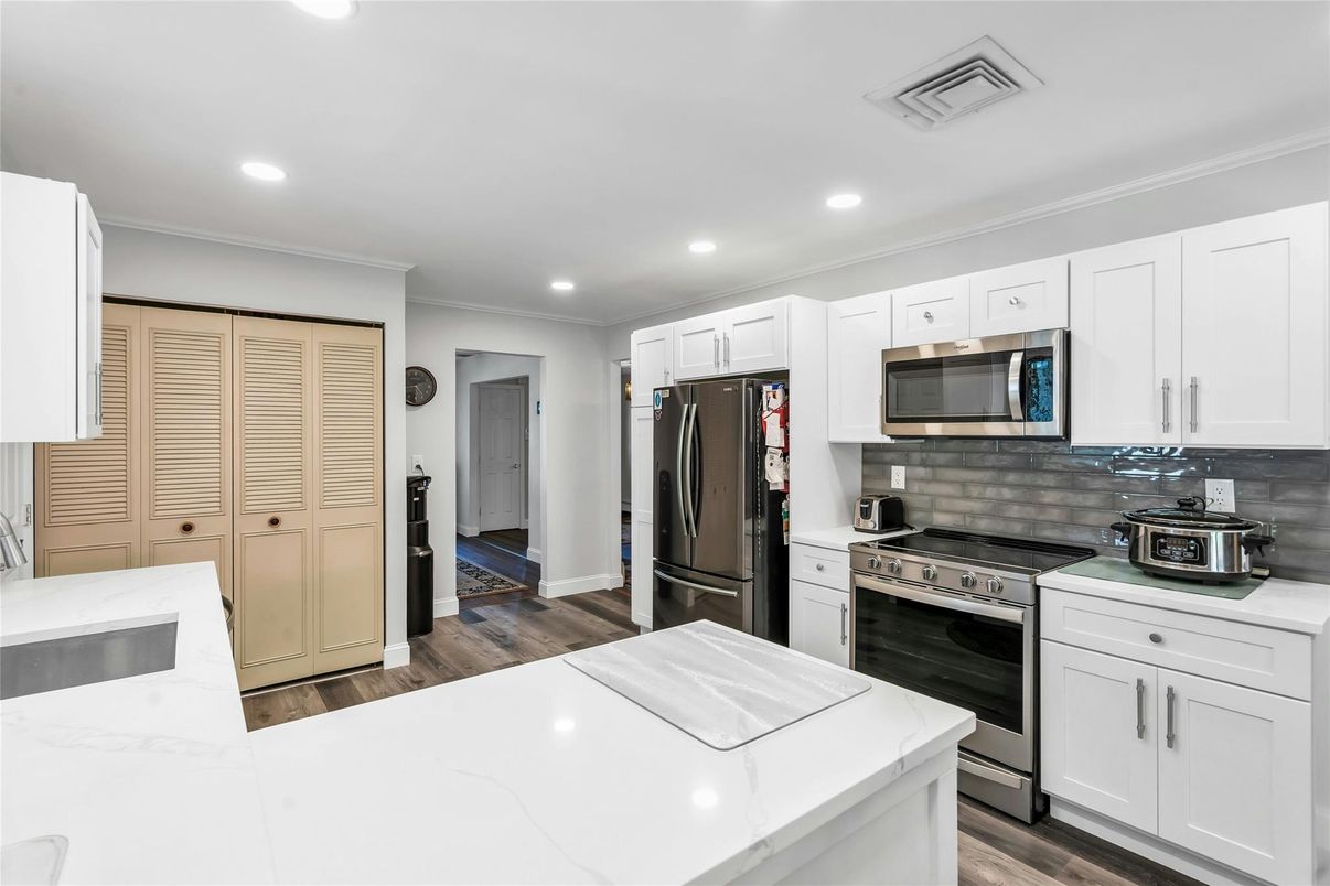 Interior, Kitchen, Recessed Lighting, Stainless Steel Appliances, Wood Texture Flooring