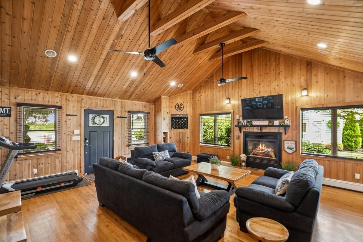 Fireplace, Fitness Equipment, Interior, Living room, Recessed Lighting, Wooden Beams, Wooden Ceilings, Wood Texture Flooring, Wooden Walls