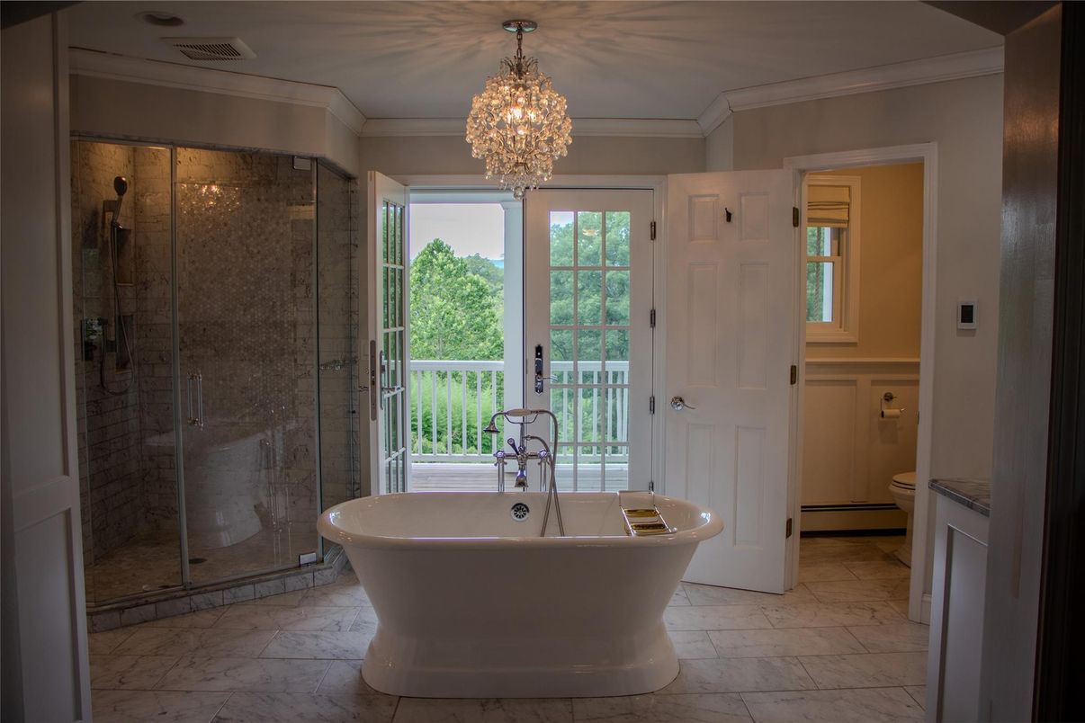 Bathroom, Chandelier, Free Standing Baths, Glass Shower, Interior, Marble, Marble Walls