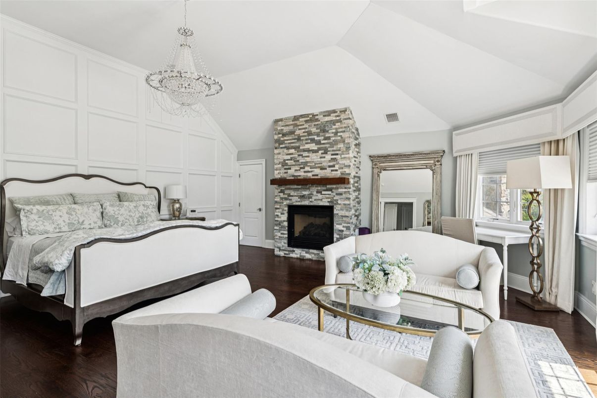 Bedroom, Chandelier, Fireplace, Interior, Living room, Stone Walls, Wood Texture Flooring