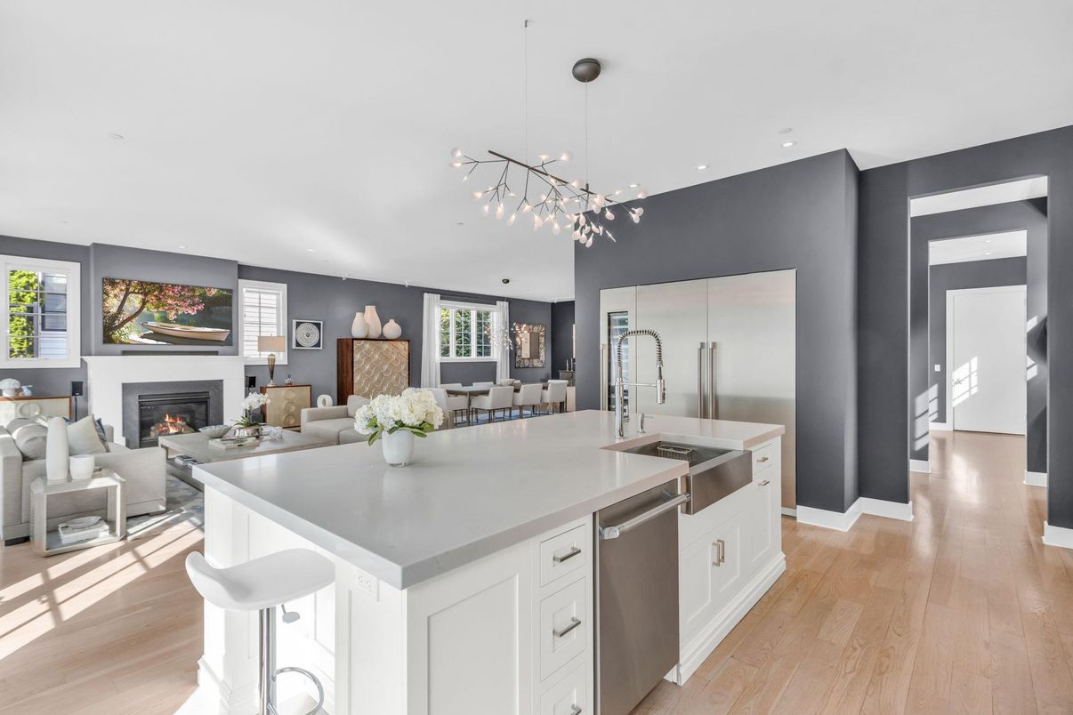 Dining room, Fireplace, Interior, Kitchen, Living room, Pendant Lights, Recessed Lighting, Stainless Steel Appliances, Wood Texture Flooring