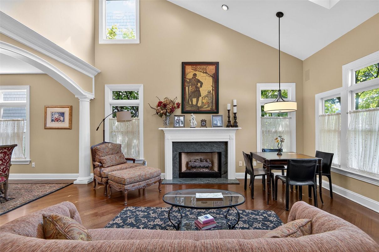 Dining room, Fireplace, Interior, Living room, Pendant Lights, Recessed Lighting, Wood Texture Flooring