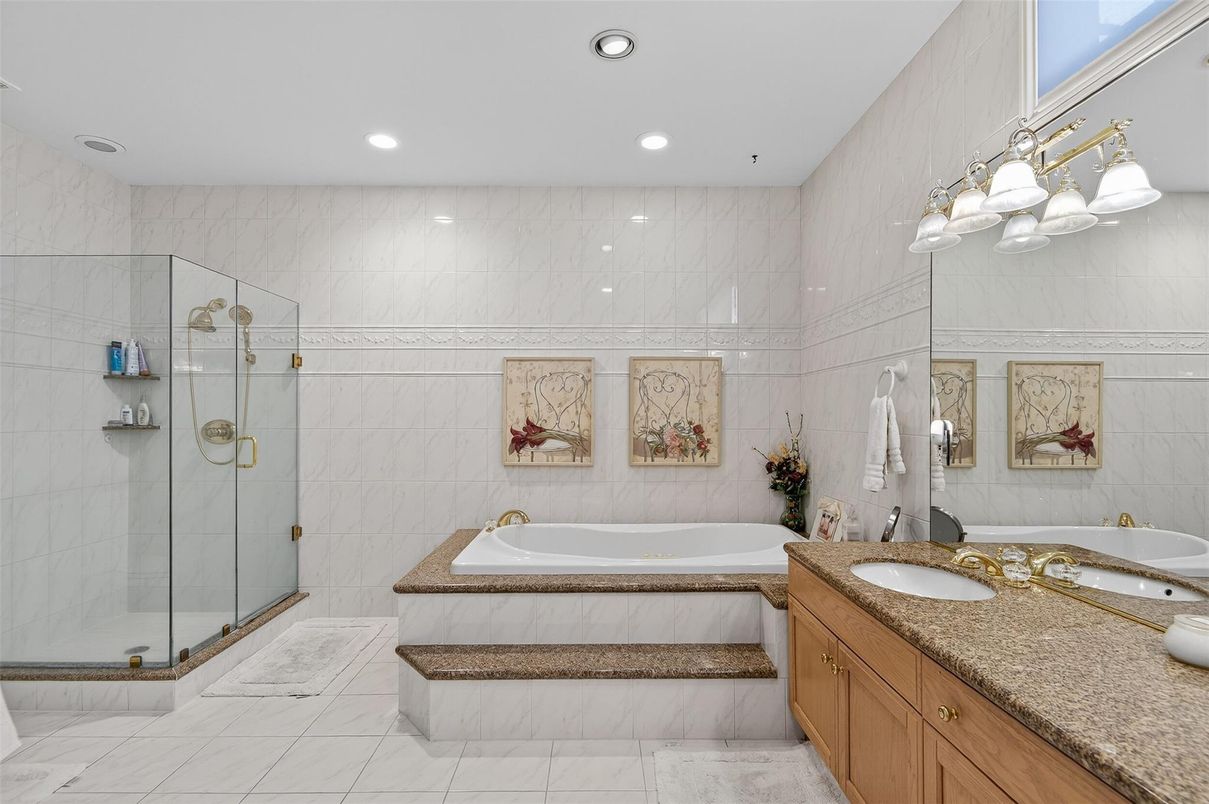 Bathroom, Dual Sink Vanities, Glass Shower, Interior, Marble, Marble Walls, Recessed Lighting