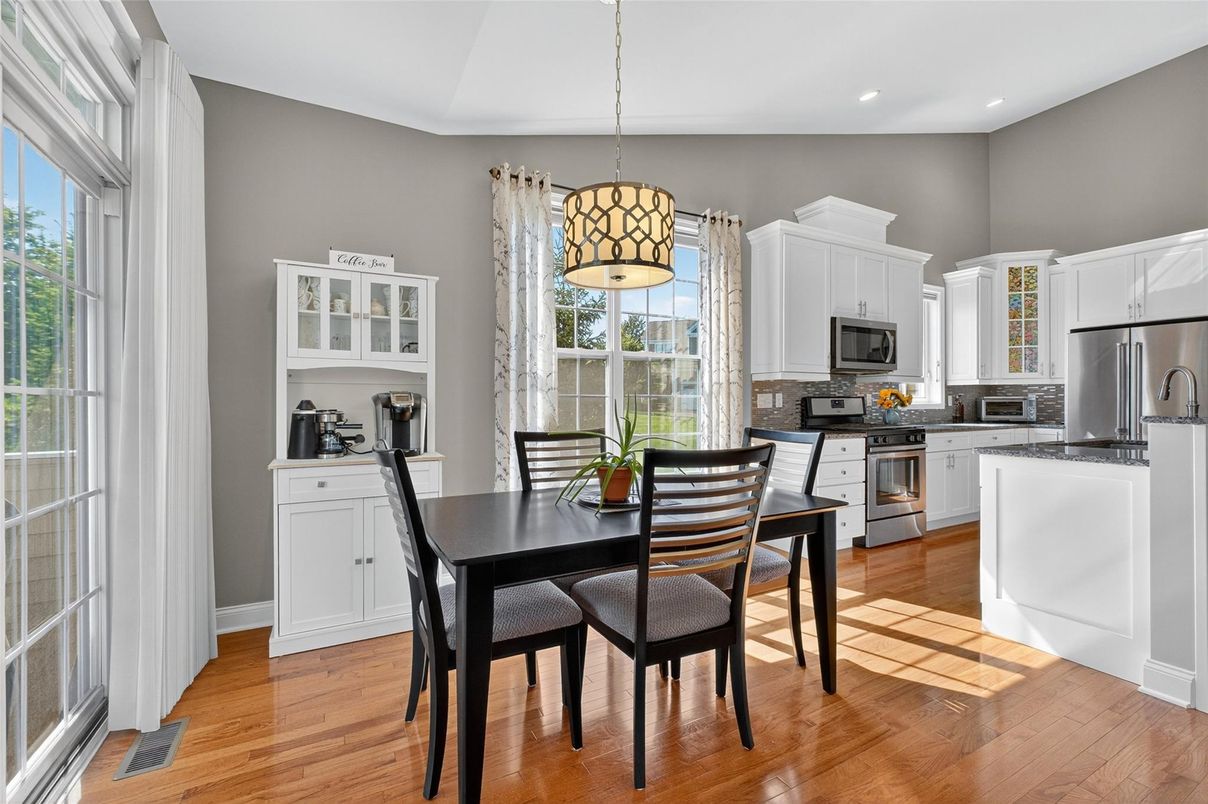 Dining room, Interior, Kitchen, Pendant Lights, Recessed Lighting, Stainless Steel Appliances, Wood Texture Flooring