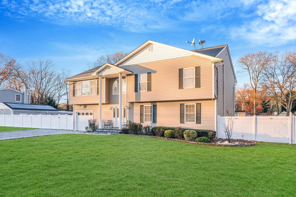 Attached, Backyard, Exterior, Facade, Solar Panels, Split Level