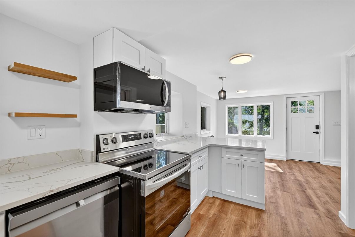 Interior, Kitchen, Recessed Lighting, Stainless Steel Appliances, Wood Texture Flooring