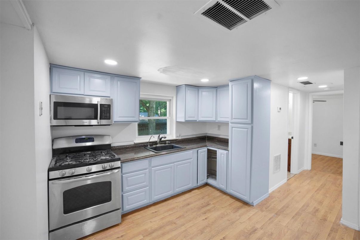 Interior, Kitchen, Recessed Lighting, Stainless Steel Appliances, Wood Texture Flooring