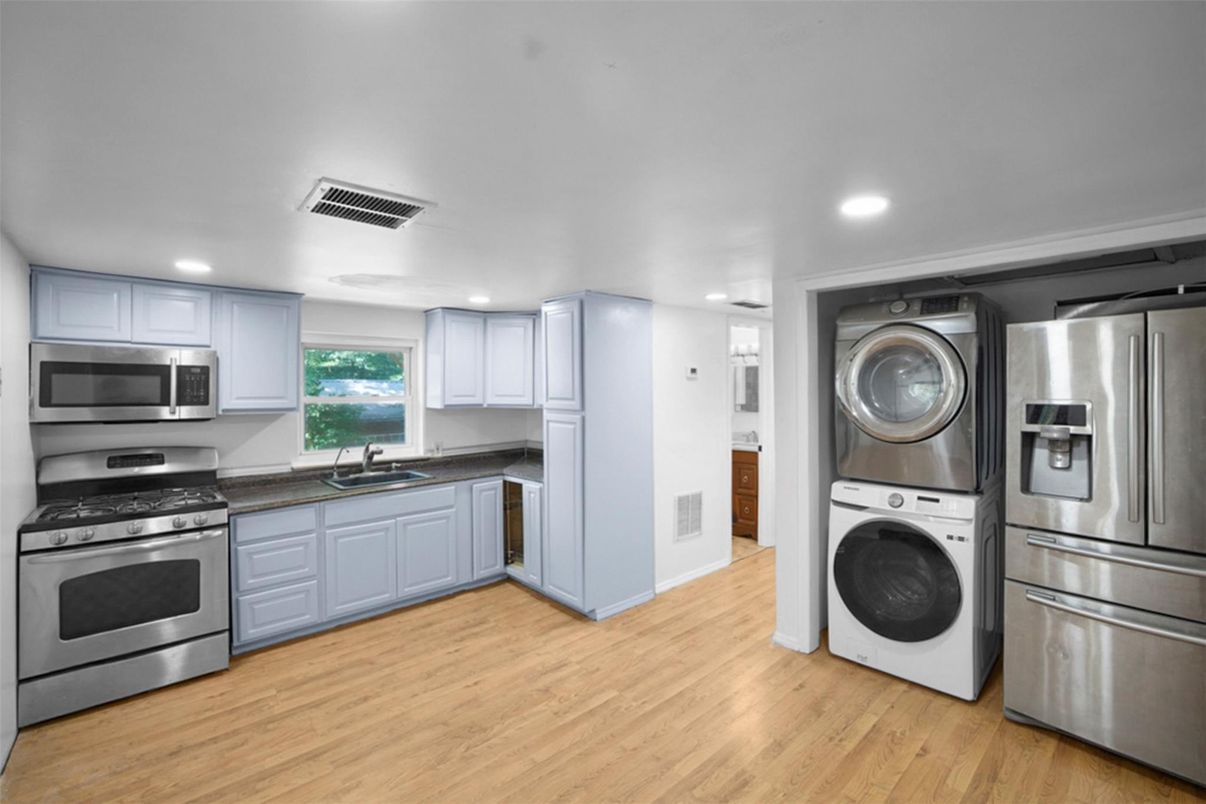 Interior, Kitchen, Recessed Lighting, Stainless Steel Appliances, Washer, Wood Texture Flooring