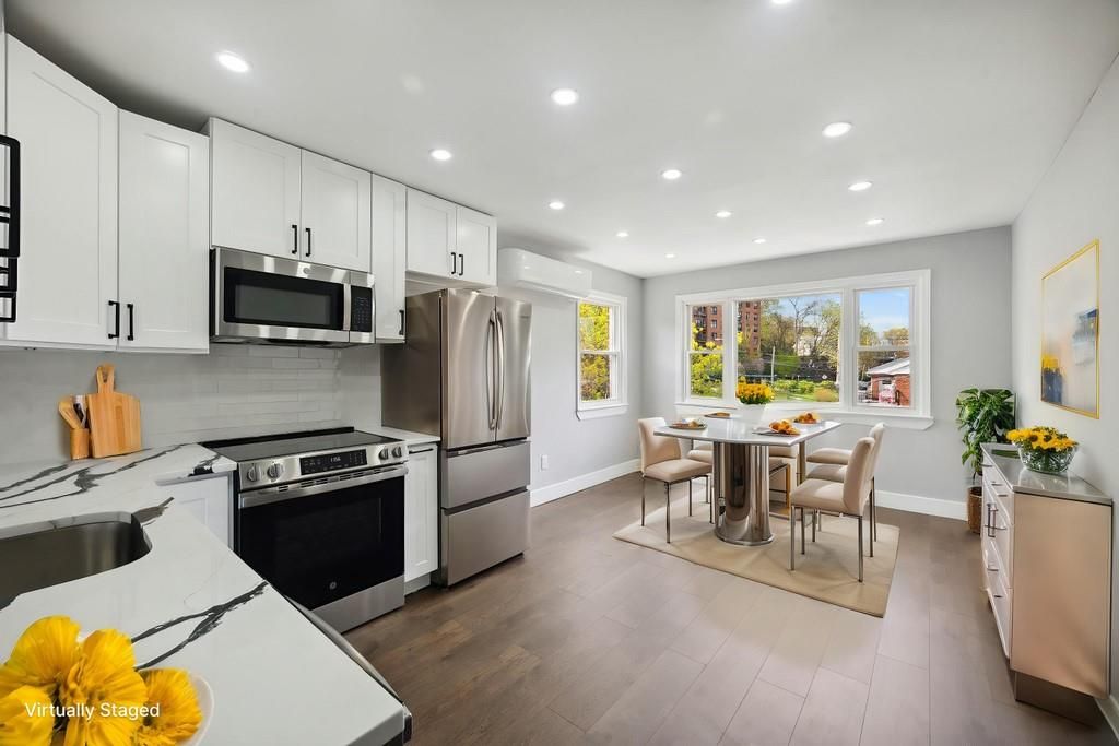 Dining room, Interior, Kitchen, Recessed Lighting, Stainless Steel Appliances, Wood Texture Flooring