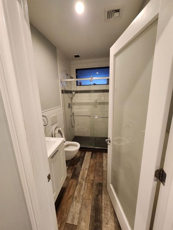 Bathroom, Glass Shower, Interior, Recessed Lighting, Wood Texture Flooring