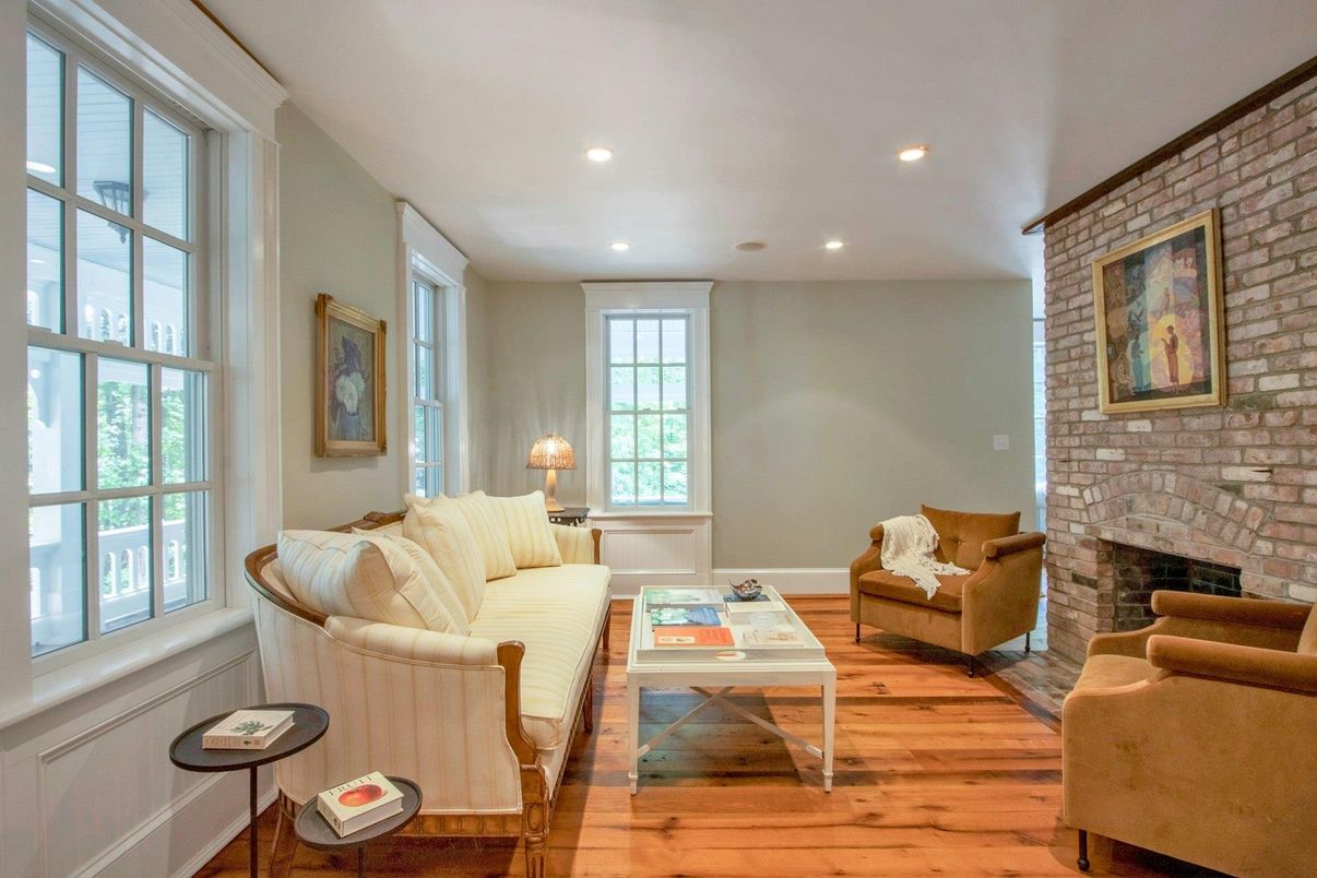 Fireplace, Interior, Living room, Recessed Lighting, Stone Walls, Wood Texture Flooring
