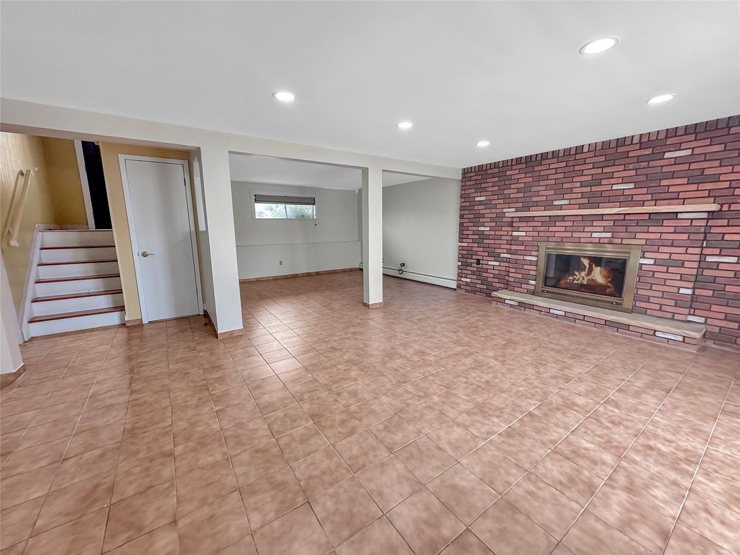 Empty room, Fireplace, Interior, Recessed Lighting, Stone Walls