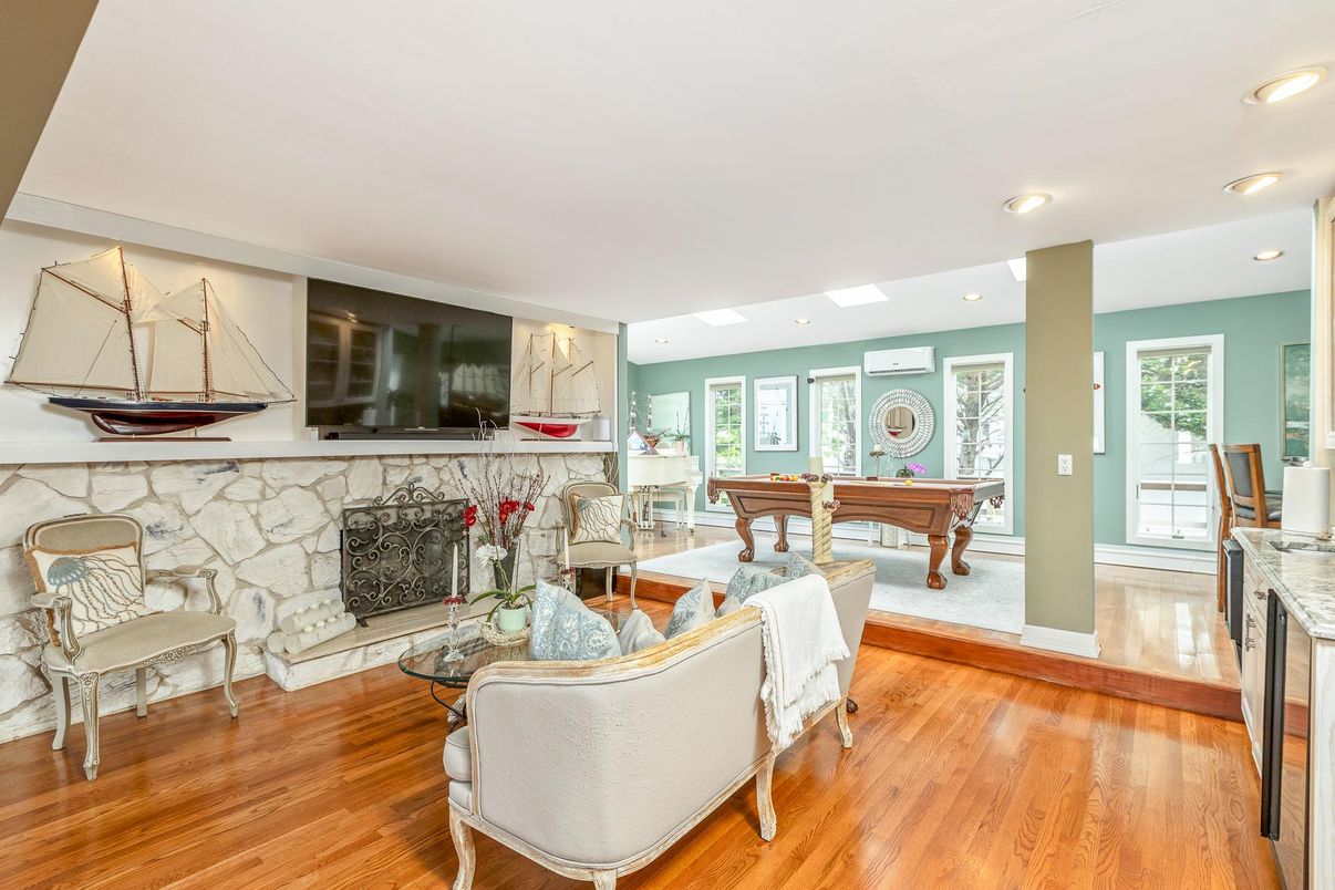 Billiard Table, Fireplace, Game Room, Interior, Living room, Recessed Lighting, Wood Texture Flooring
