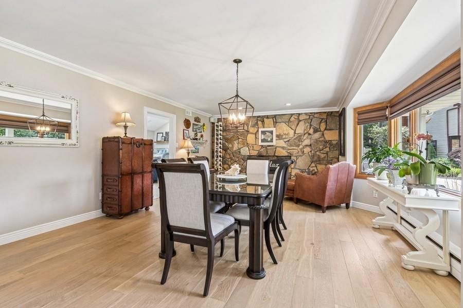 Dining room, Fireplace, Interior, Pendant Lights, Recessed Lighting, Stone Walls, Wood Texture Flooring
