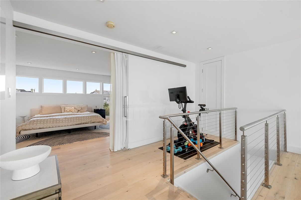 Bedroom, Fitness Equipment, Interior, Recessed Lighting, Wood Texture Flooring