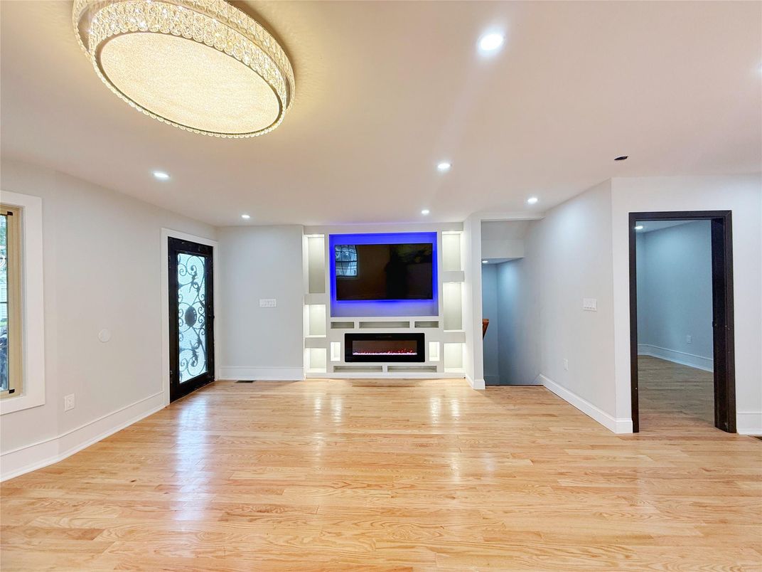 Empty room, Fireplace, Interior, Recessed Lighting, Wood Texture Flooring