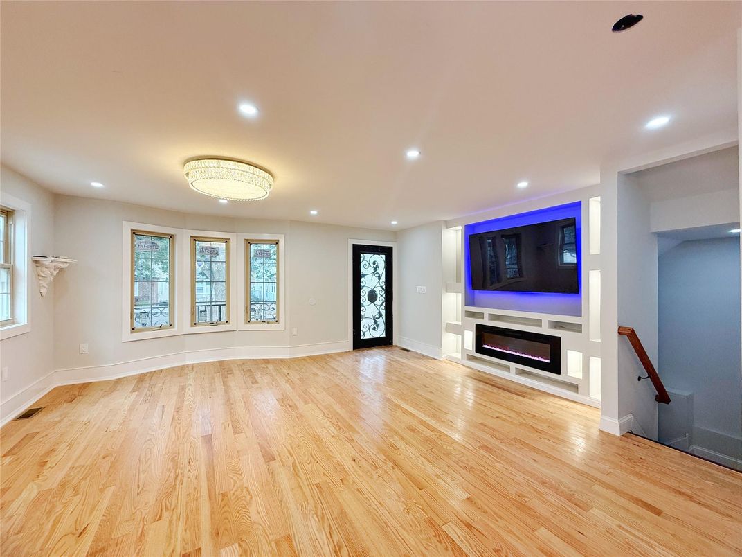 Empty room, Fireplace, Interior, Recessed Lighting, Wood Texture Flooring