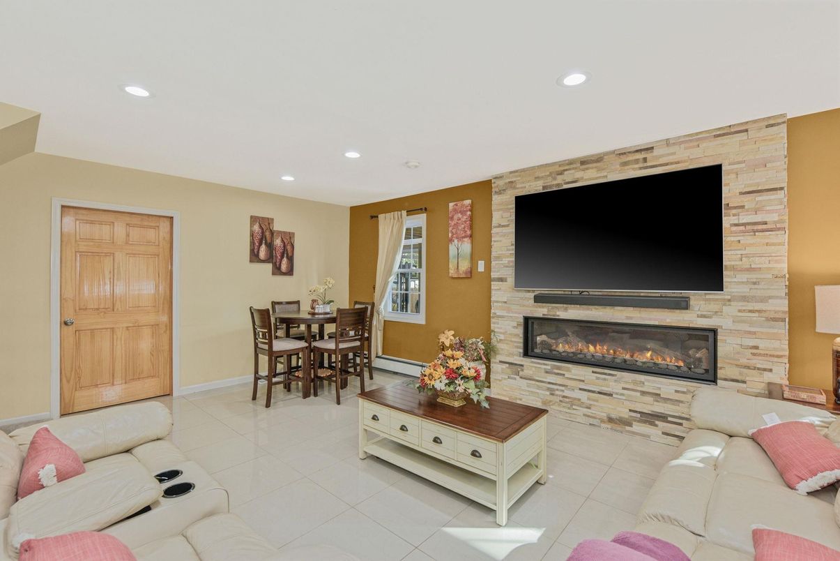Dining room, Fireplace, Interior, Living room, Recessed Lighting, Stone Walls