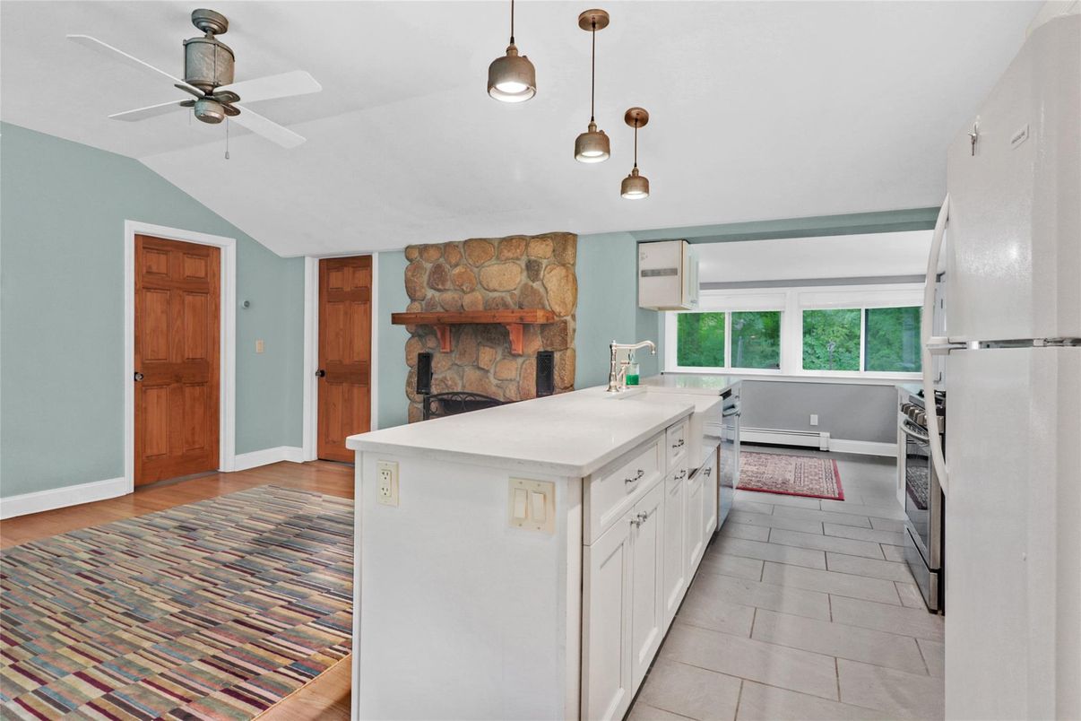 Fireplace, Interior, Kitchen, Pendant Lights, Stone Walls, Wood Texture Flooring
