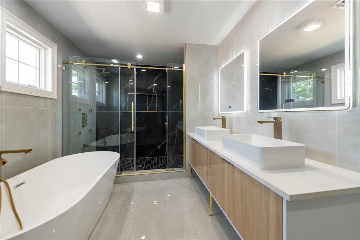 Bathroom, Dual Sink Vanities, Free Standing Baths, Glass Shower, Interior, Marble Walls, Recessed Lighting