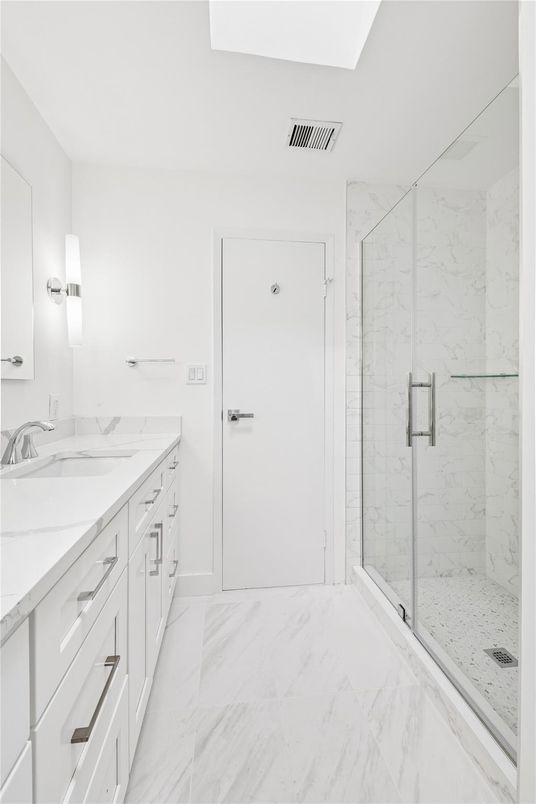 Bathroom, Dual Sink Vanities, Glass Shower, Interior, Marble, Marble Walls