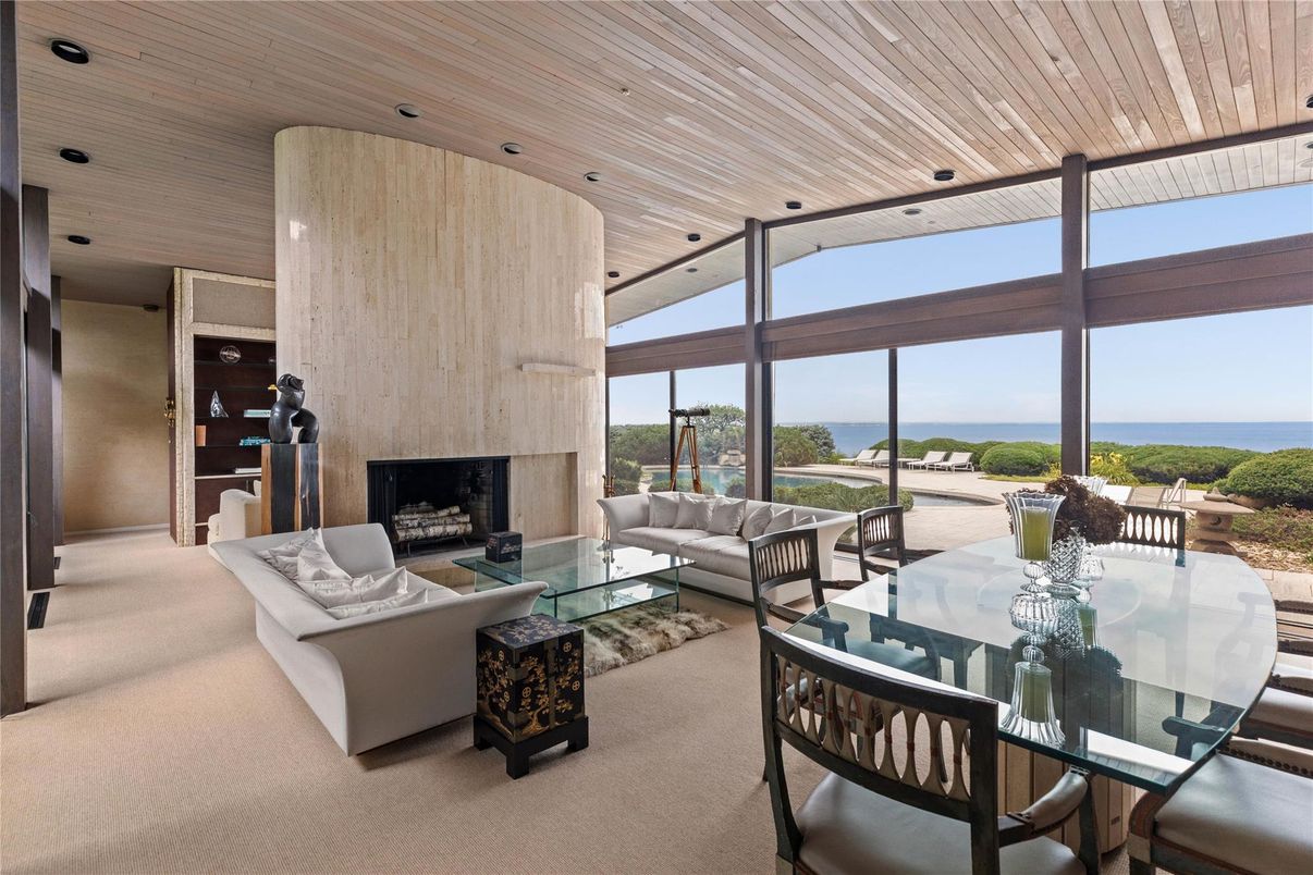 Dining room, Fireplace, Interior, Living room, Recessed Lighting, Water, Wooden Ceilings