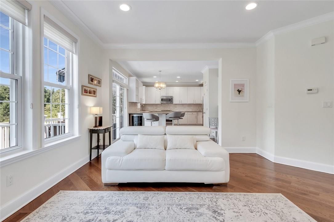 Chandelier, Dining room, Interior, Kitchen, Recessed Lighting, Stainless Steel Appliances, Wood Texture Flooring