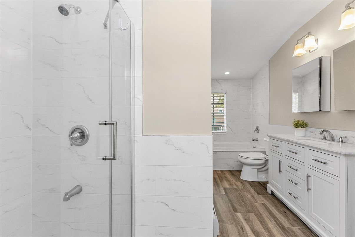 Bathroom, Glass Shower, Interior, Marble Walls, Recessed Lighting, Wood Texture Flooring