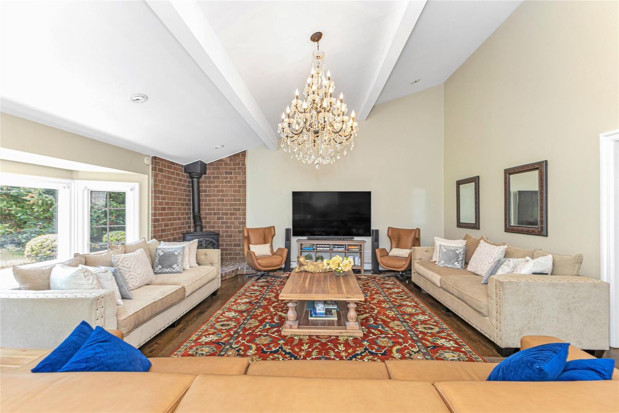 Chandelier, Fireplace, Interior, Living room, Recessed Lighting, Stone Walls