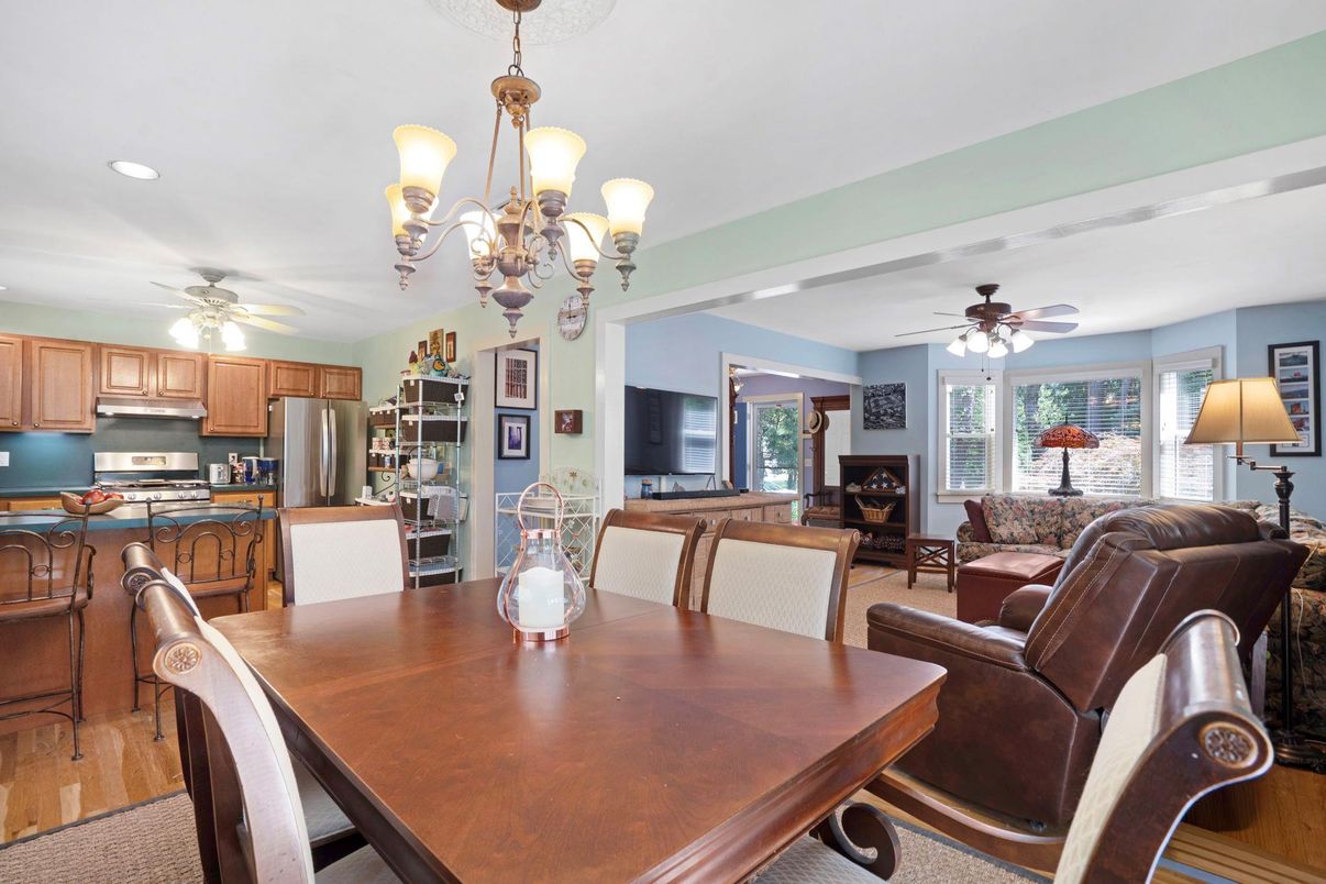 Chandelier, Dining room, Interior, Kitchen, Living room, Recessed Lighting, Stainless Steel Appliances, Wood Texture Flooring