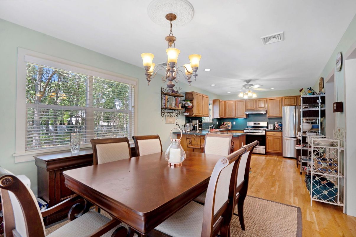 Chandelier, Dining room, Interior, Kitchen, Recessed Lighting, Stainless Steel Appliances, Wood Texture Flooring