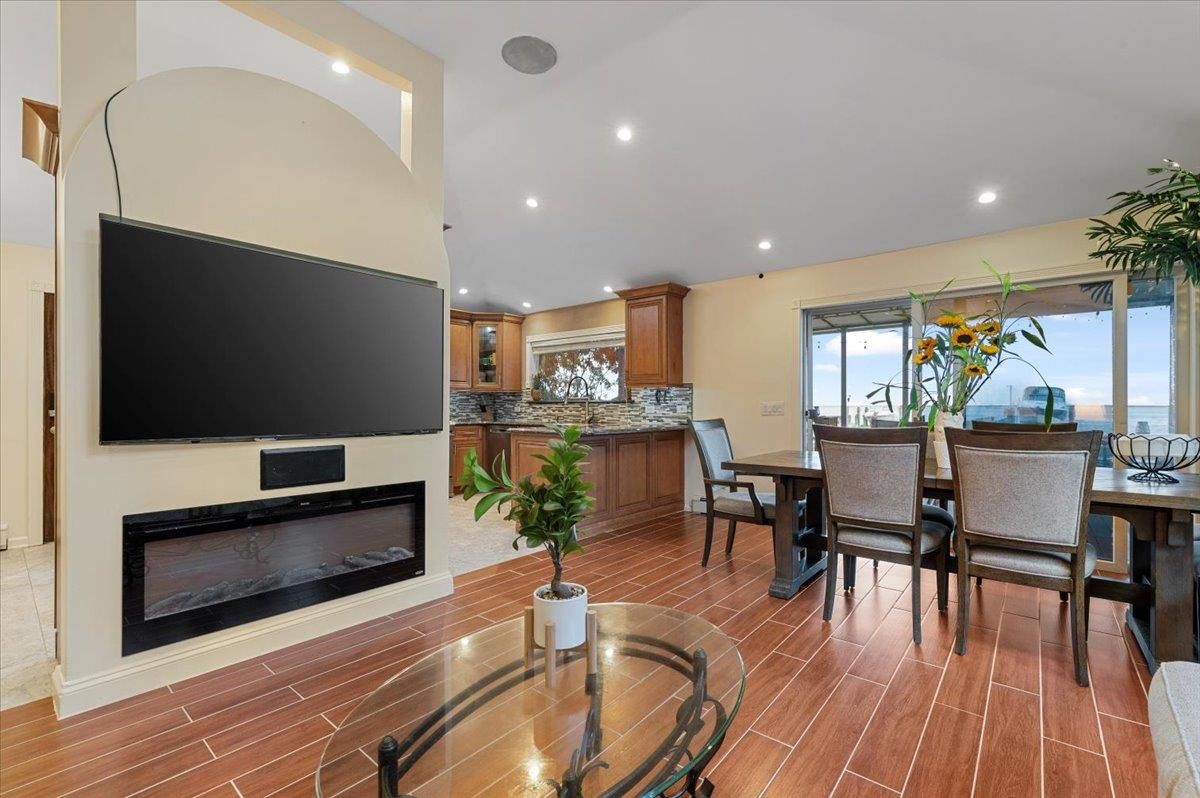 Dining room, Fireplace, Interior, Recessed Lighting, Water, Wood Texture Flooring