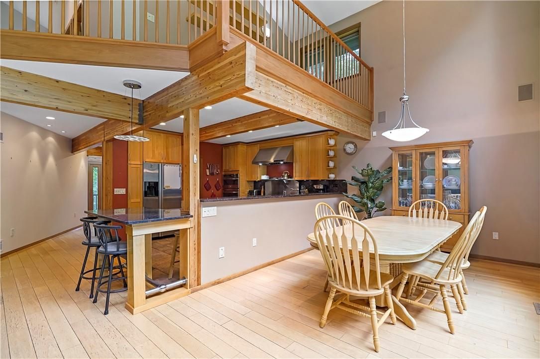 Dining room, Interior, Kitchen, Pendant Lights, Recessed Lighting, Stainless Steel Appliances, Wooden Beams, Wood Texture Flooring