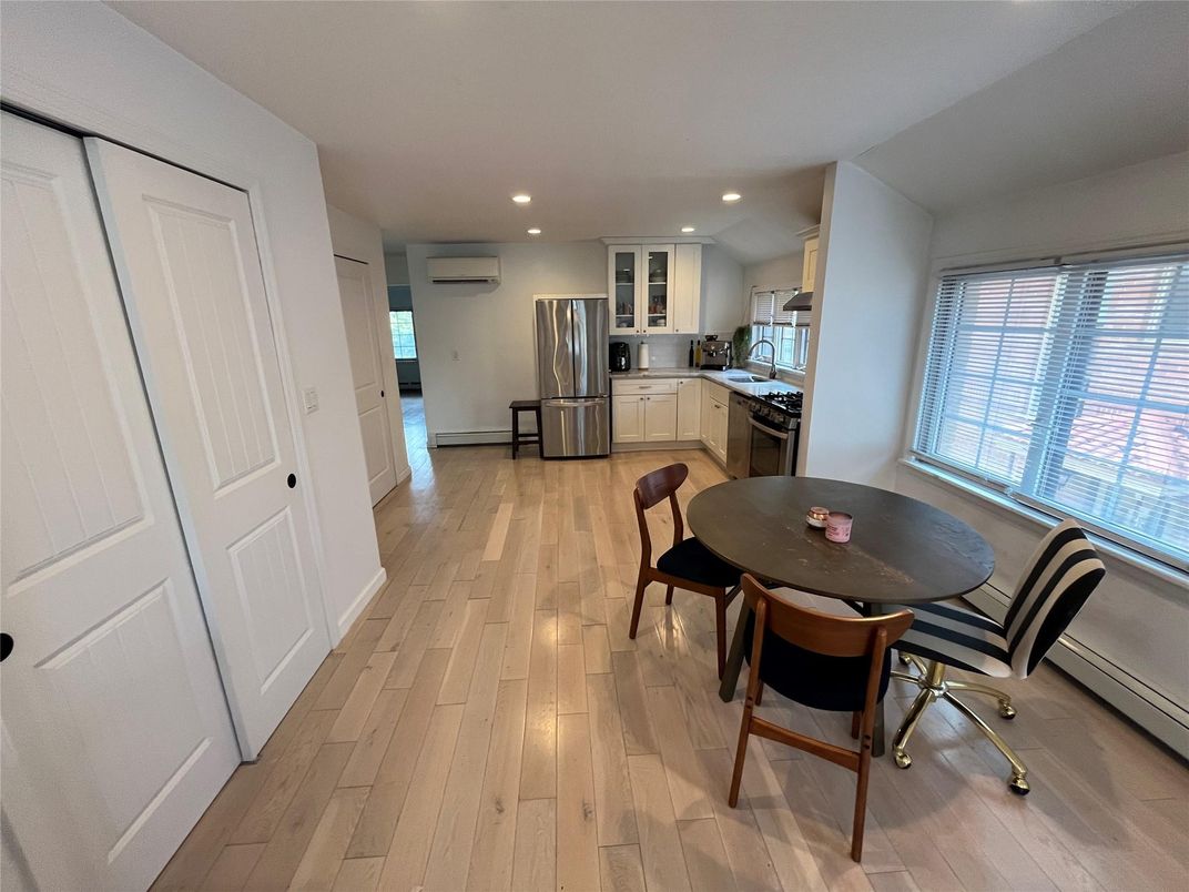 Dining room, Interior, Kitchen, Recessed Lighting, Stainless Steel Appliances, Wood Texture Flooring