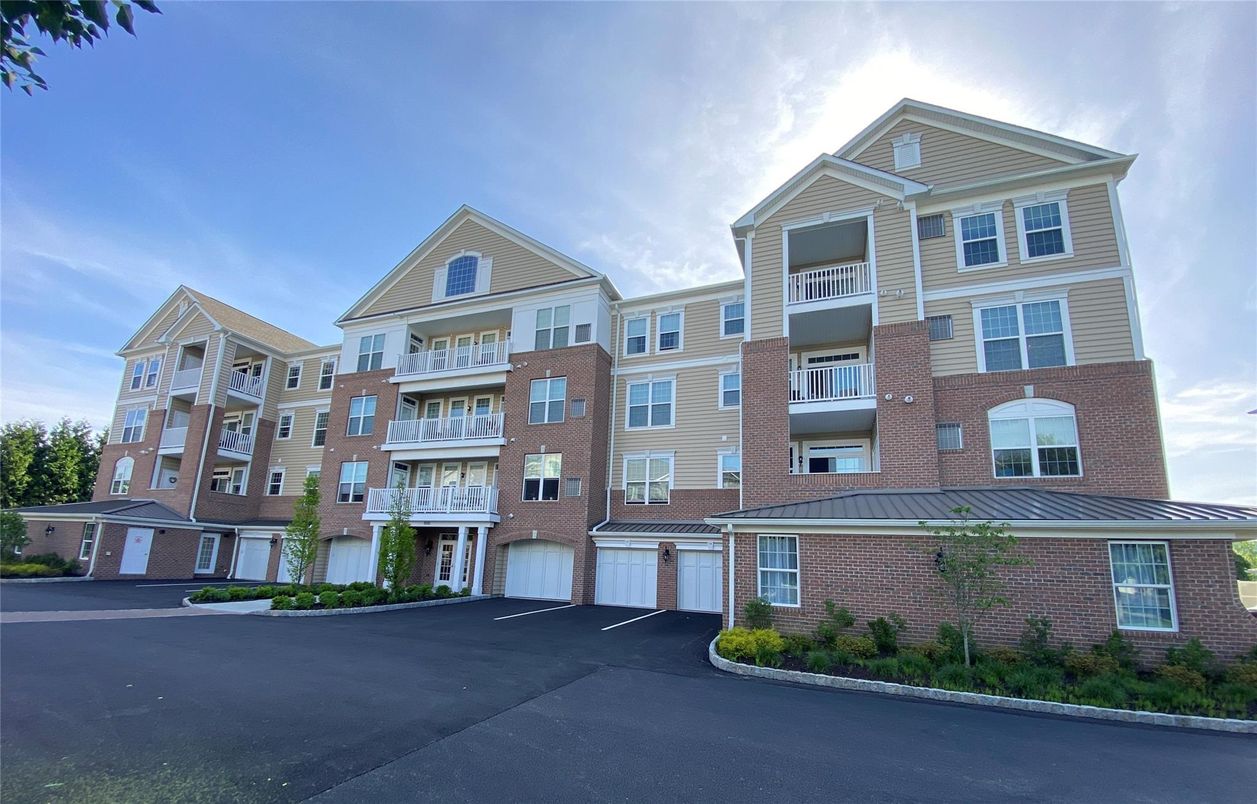 Exterior, Facade, Brick Facade, Condo Building