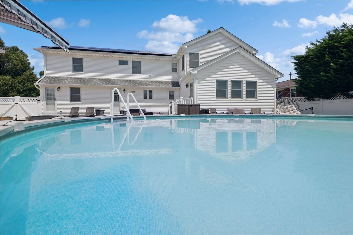 Exterior, Pool, Solar Panels