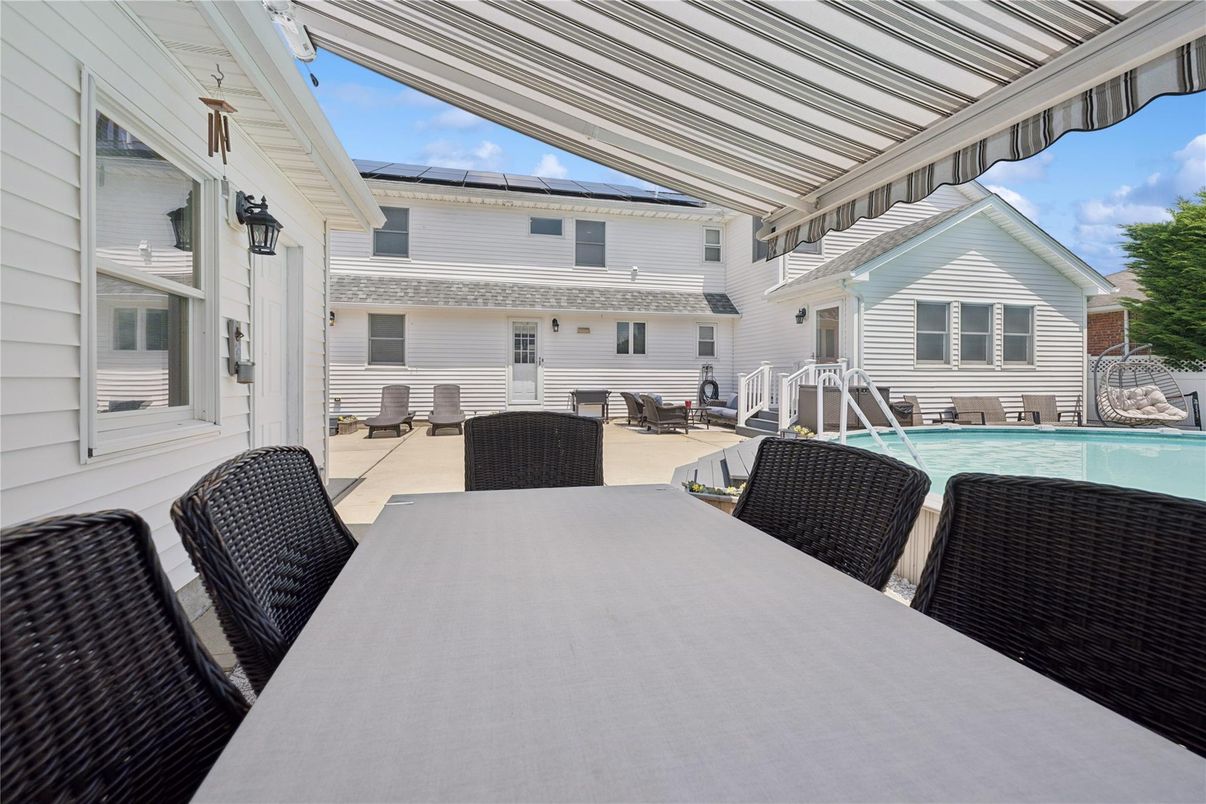 Exterior, Pool, Solar Panels