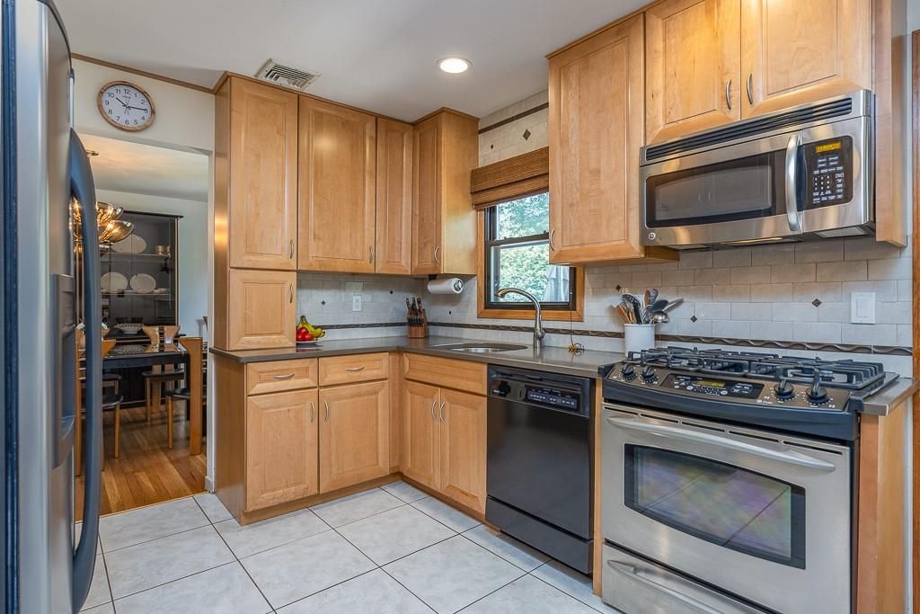 Dining room, Interior, Kitchen, Recessed Lighting, Stainless Steel Appliances, Wood Texture Flooring