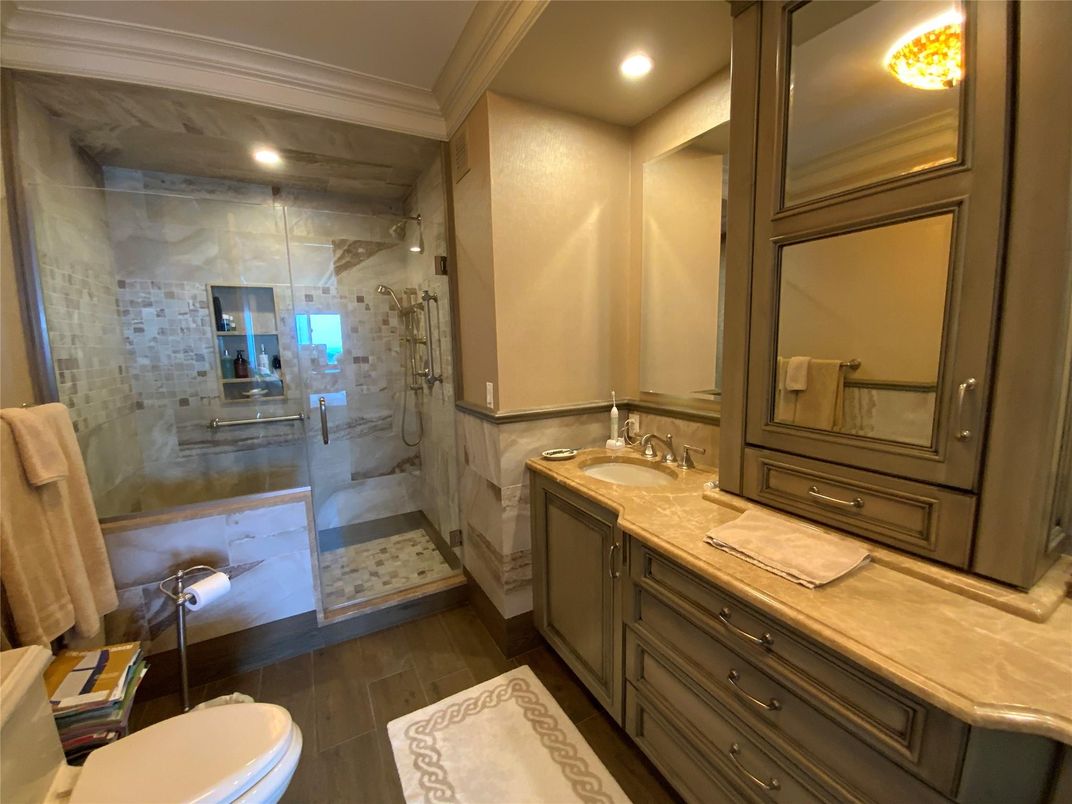 Bathroom, Dual Sink Vanities, Glass Shower, Interior, Recessed Lighting, Wood Texture Flooring