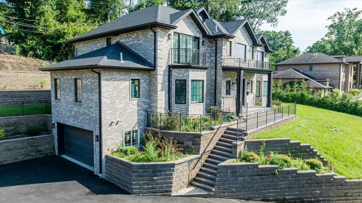 Attached, Exterior, Facade, Brick Facade, French Provincial