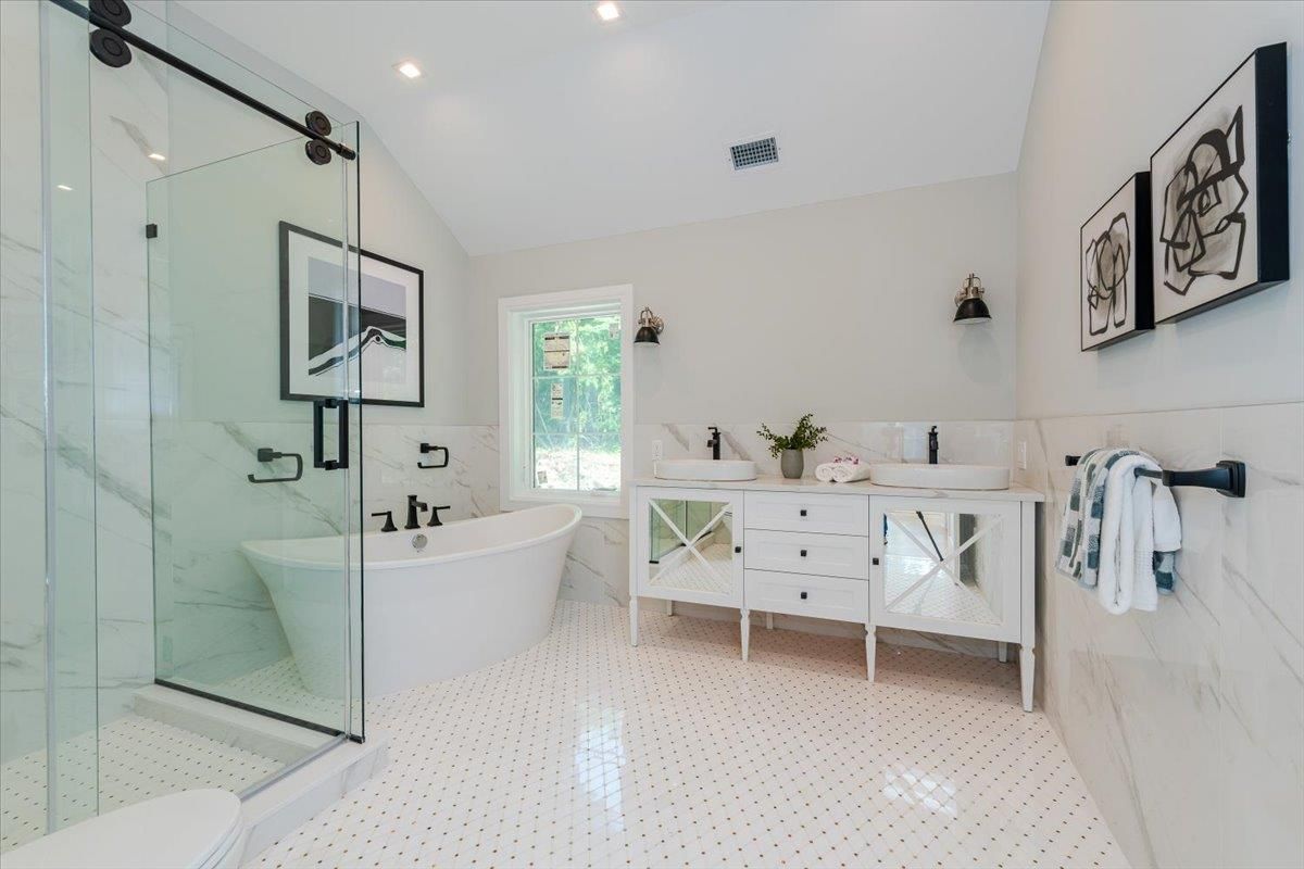 Bathroom, Dual Sink Vanities, Free Standing Baths, Glass Shower, Interior, Marble Walls, Recessed Lighting